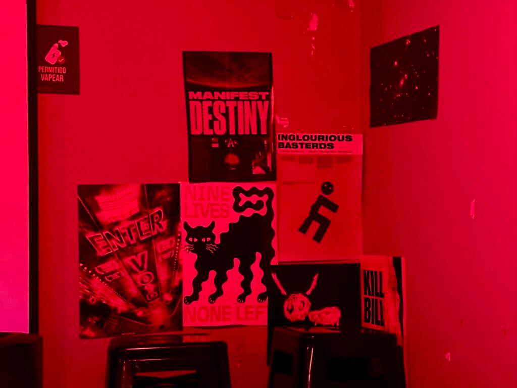 Posters on all the walls of Tempo Bar Pueblo Libre